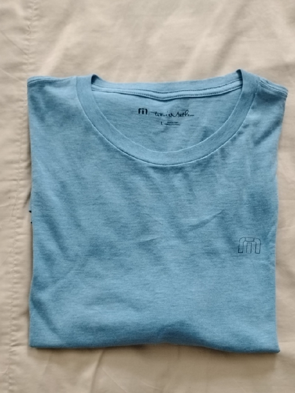 Travis Mathews golf shirt